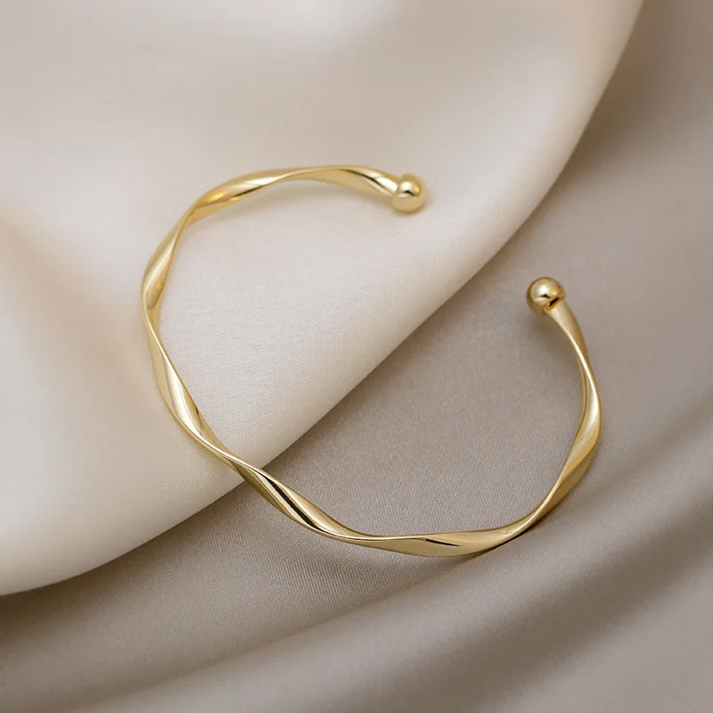 Open Twisted Gold Bangle